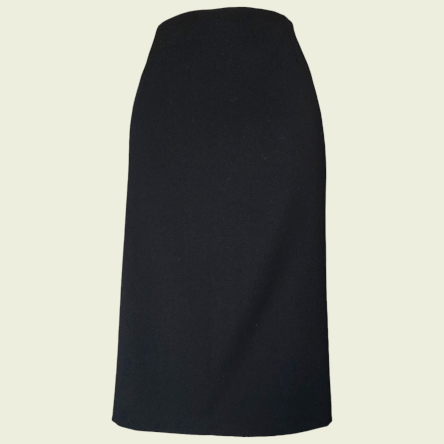 Black skirt on a beige background