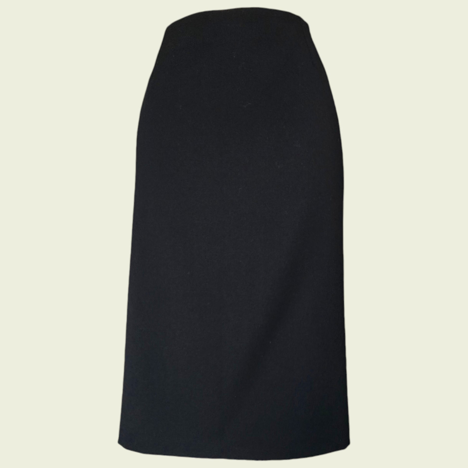 Black skirt on a beige background