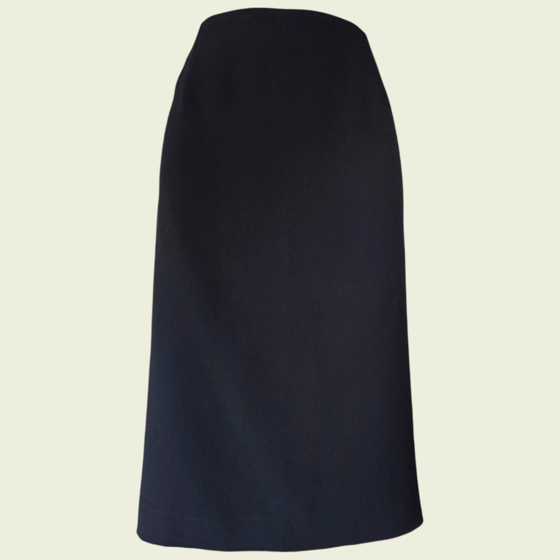 Black skirt on a beige background