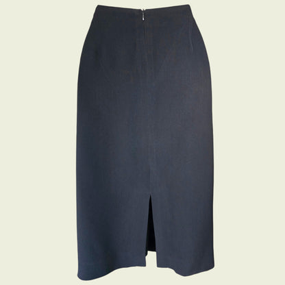 Black pencil skirt on a beige background