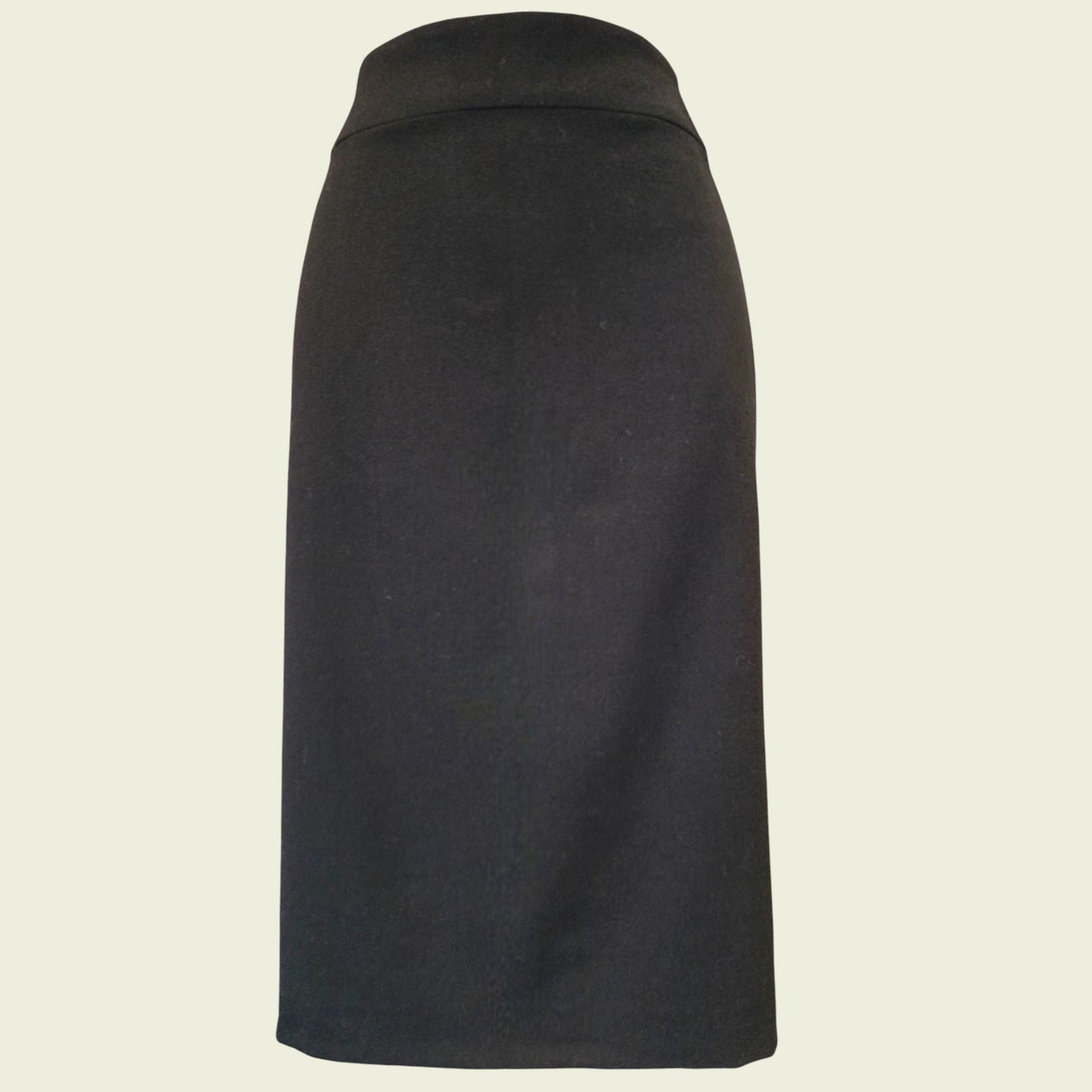 Black skirt on a beige background