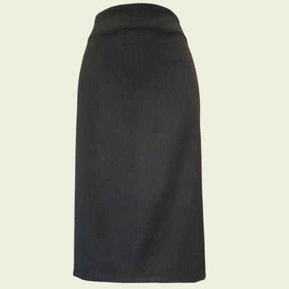 Black skirt on a beige background