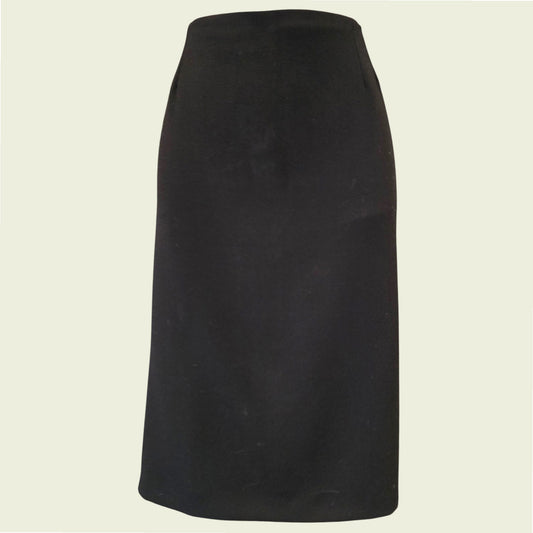 Black skirt on a beige background