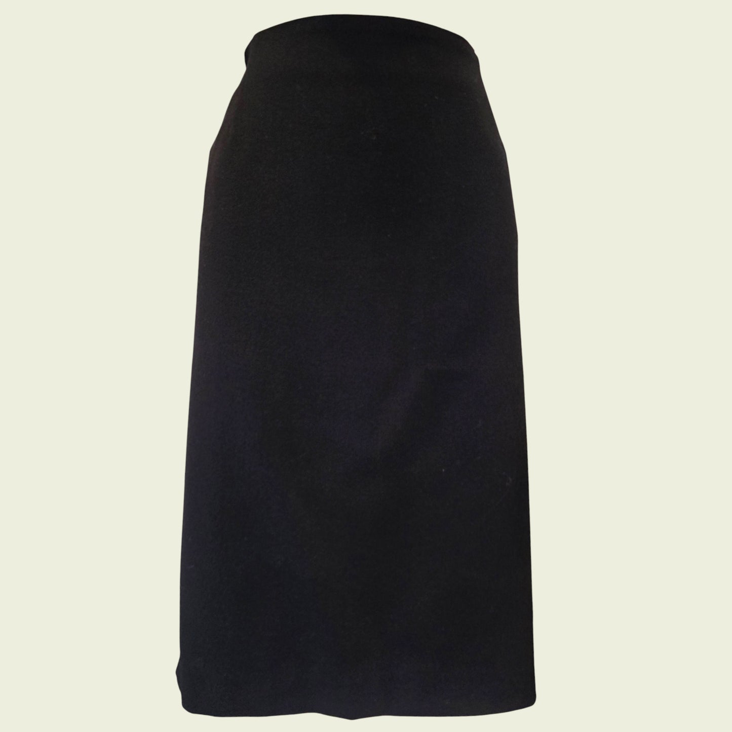 Black skirt on a beige background