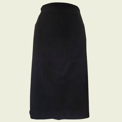 Black skirt on a beige background