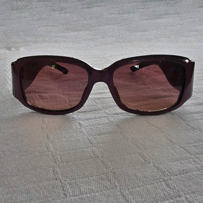 Mauve sunglasses on a white background