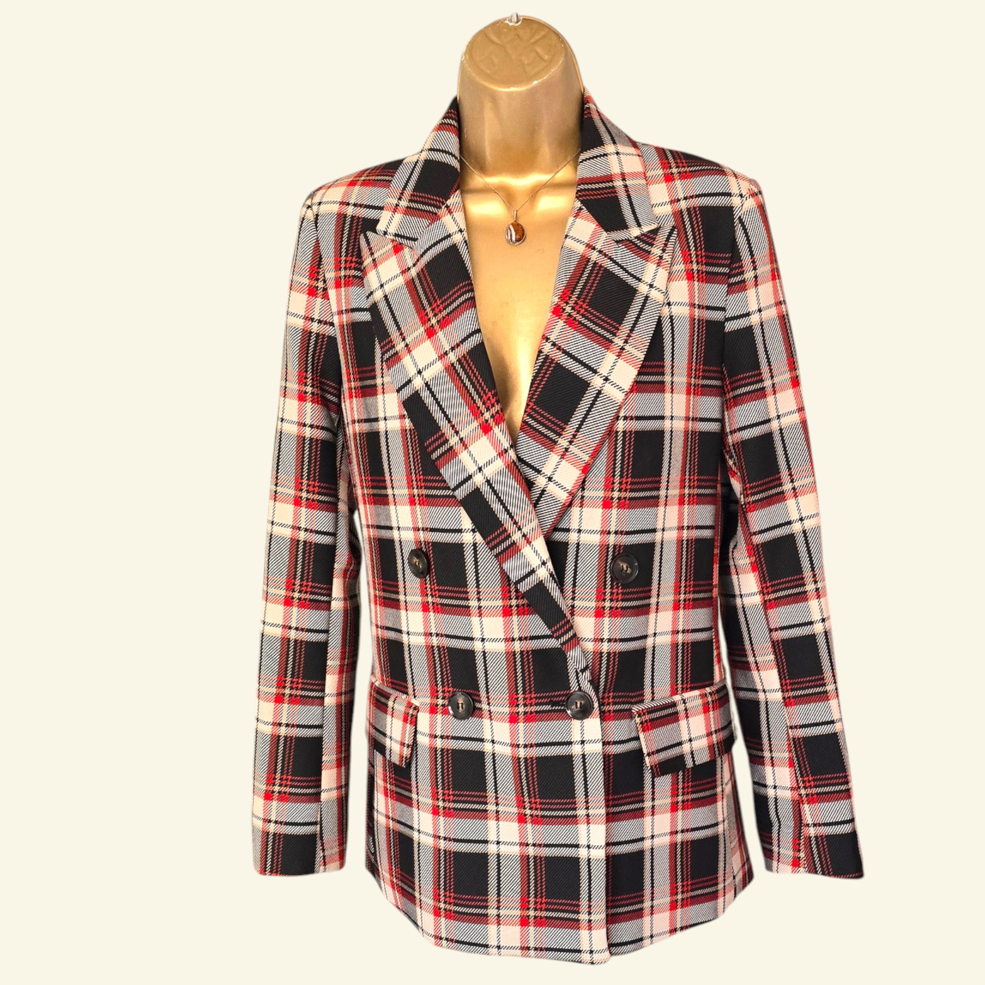 Plaid jacket on a mannequin against a white background
