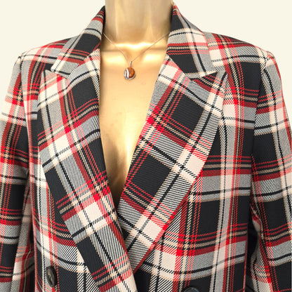 Plaid coat on a mannequin with a white background