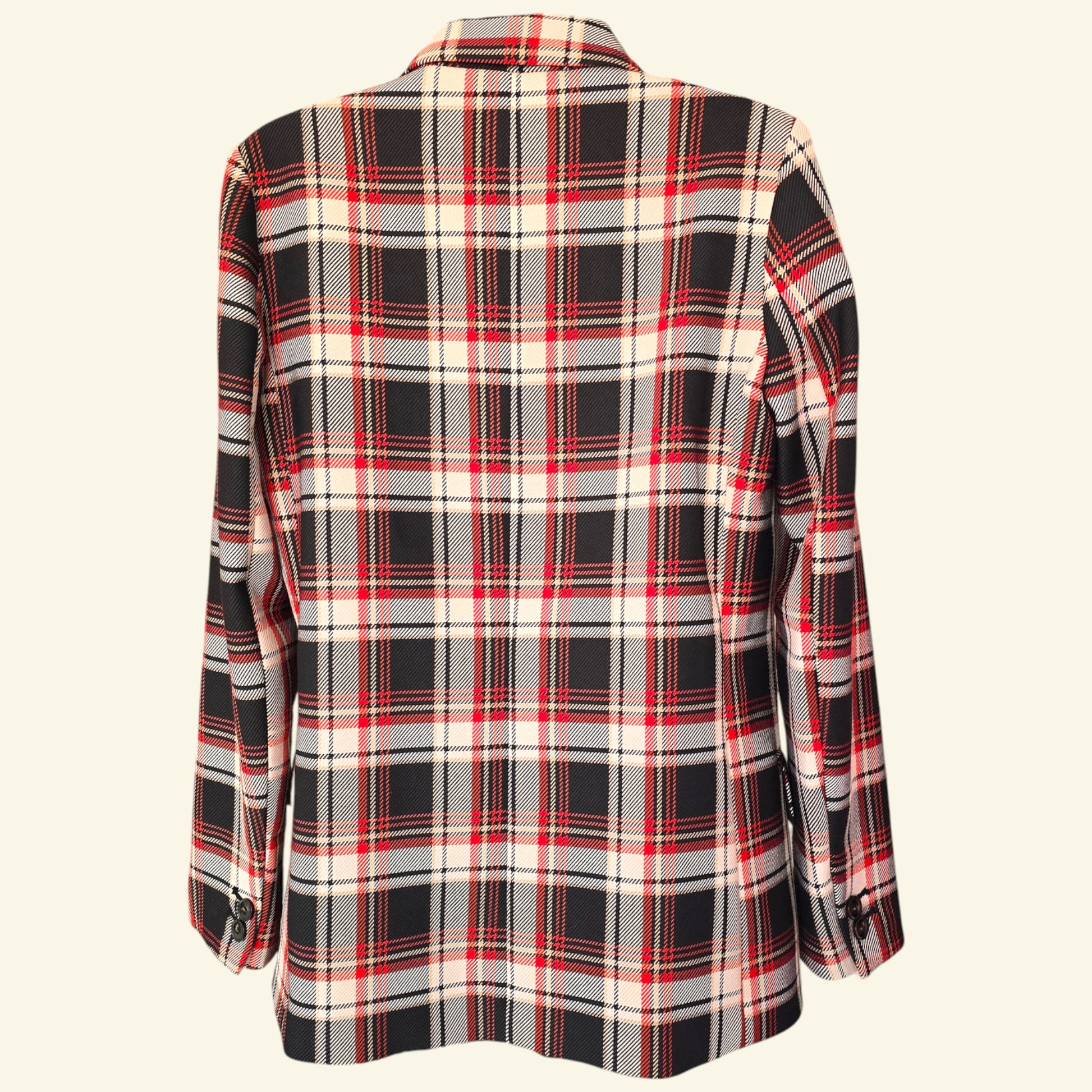 Plaid jacket with red, black, and white pattern on a beige background