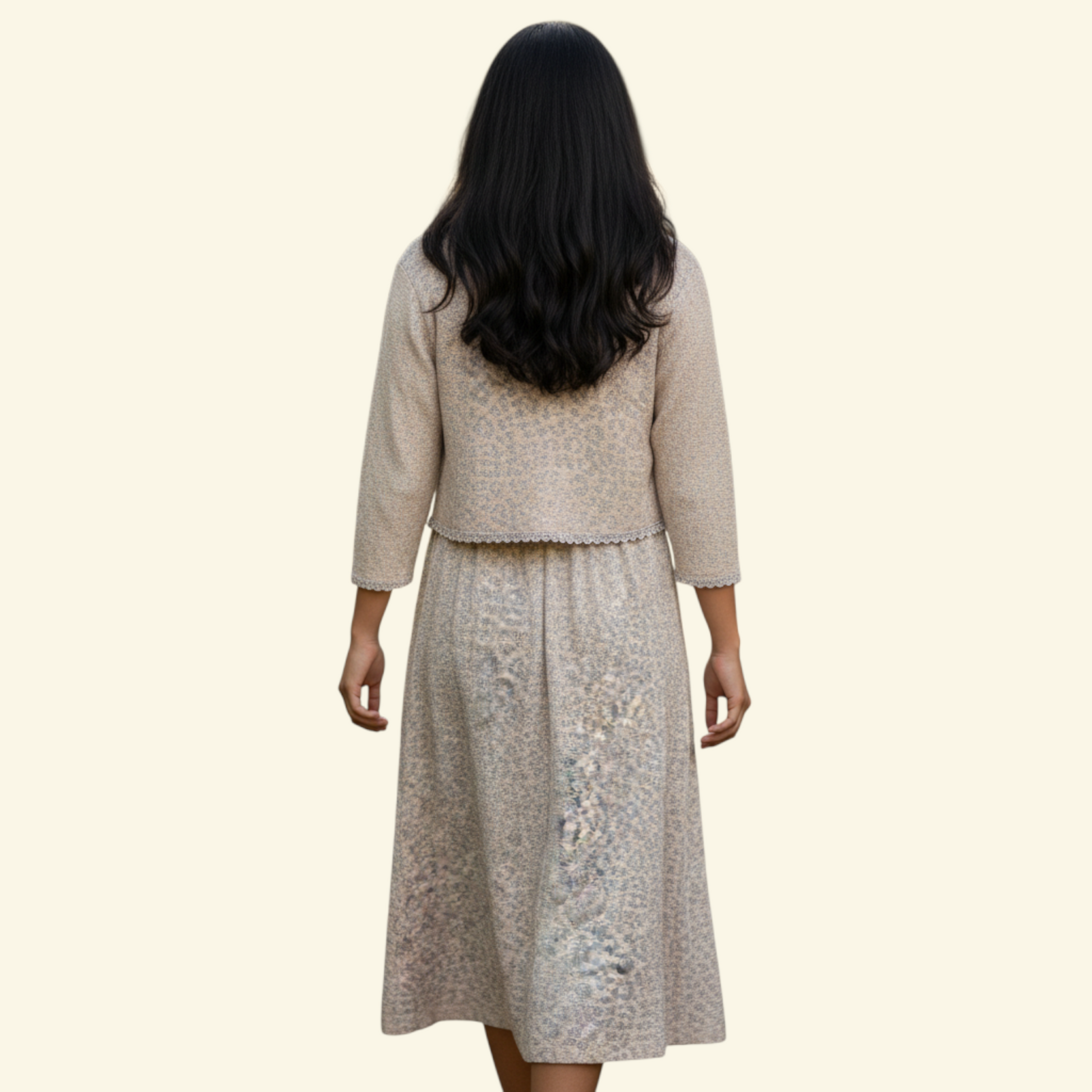 Back view of a beige dress and jacket on a white background