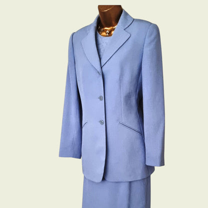 Light blue suit on a mannequin against a beige background
