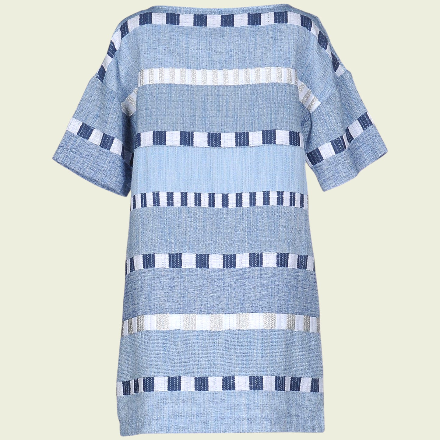 Blue and white patterned dress on a light beige background