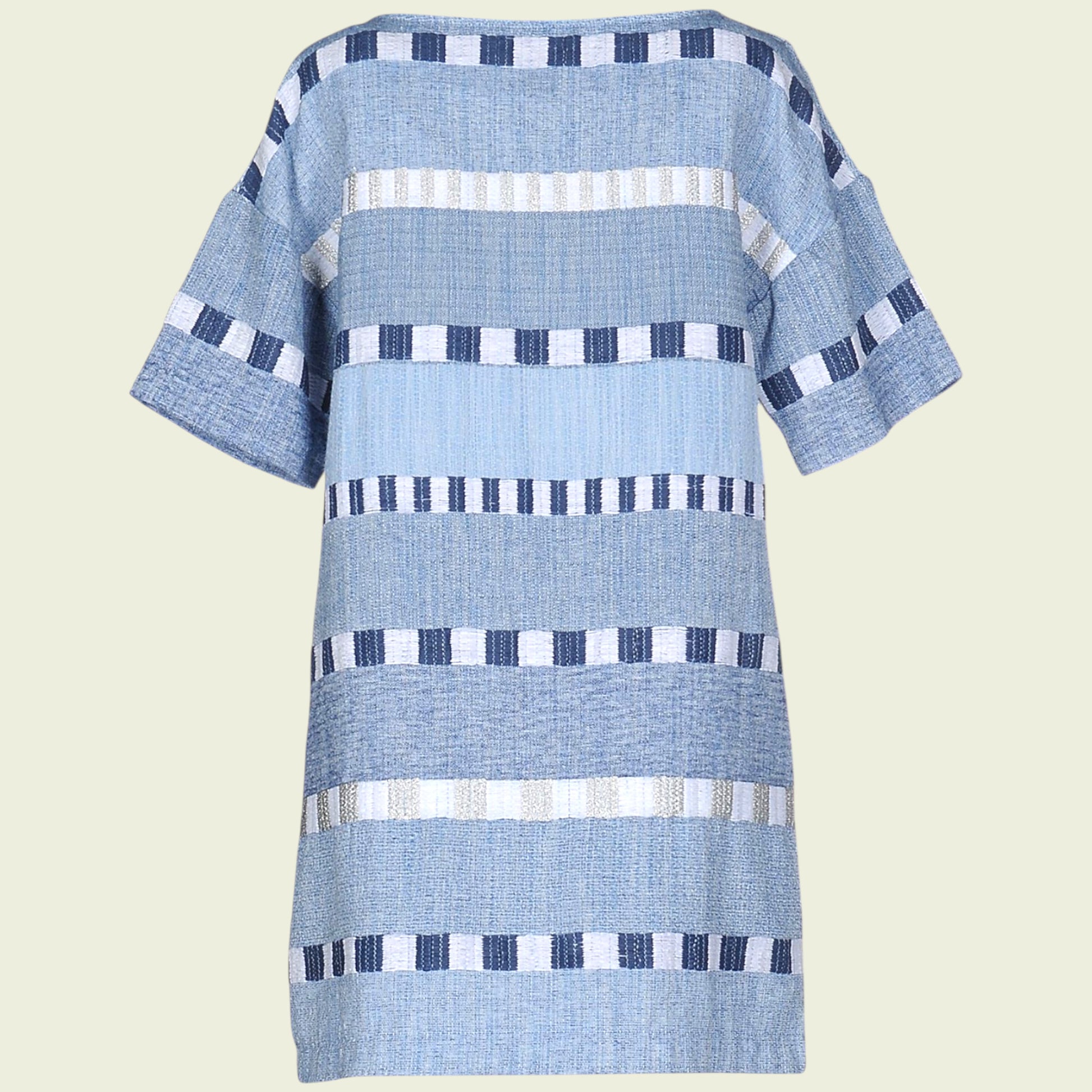Blue and white patterned dress on a light beige background