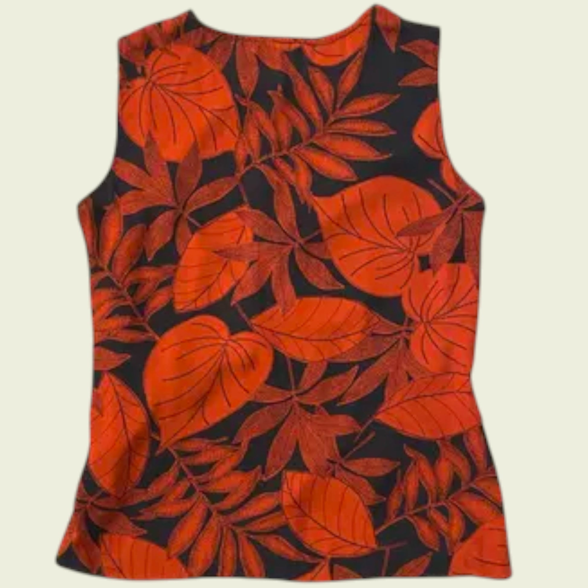 Sleeveless top with red leaf pattern on a beige background