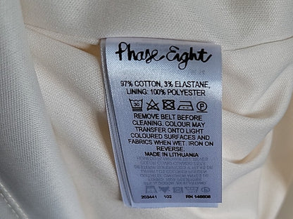 Clothing label with brand name 'Phase Eight' on a white fabric background