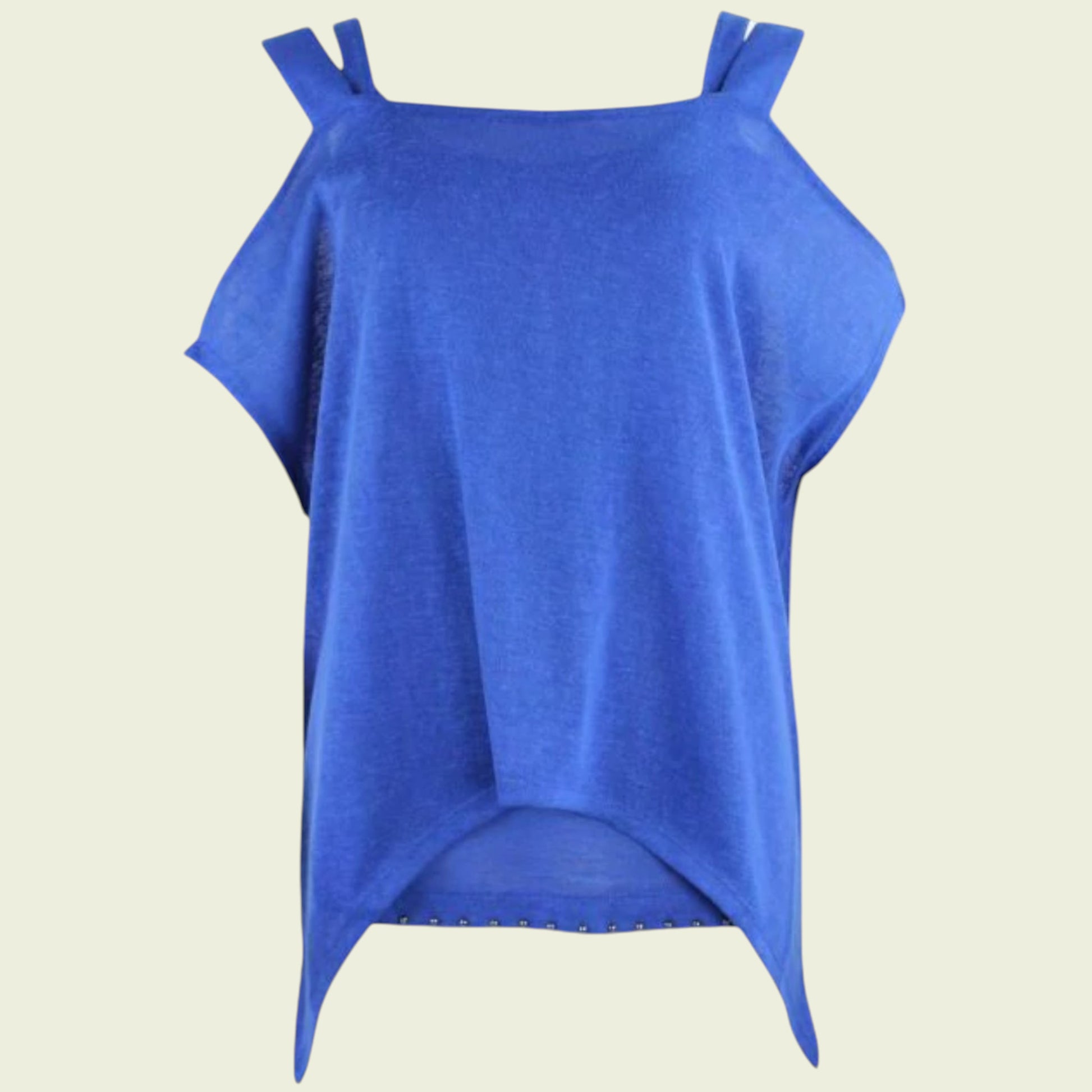Blue sleeveless top with thin straps on a beige background