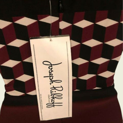 Geometric patterned garment with a Joseph Ribkoff tag