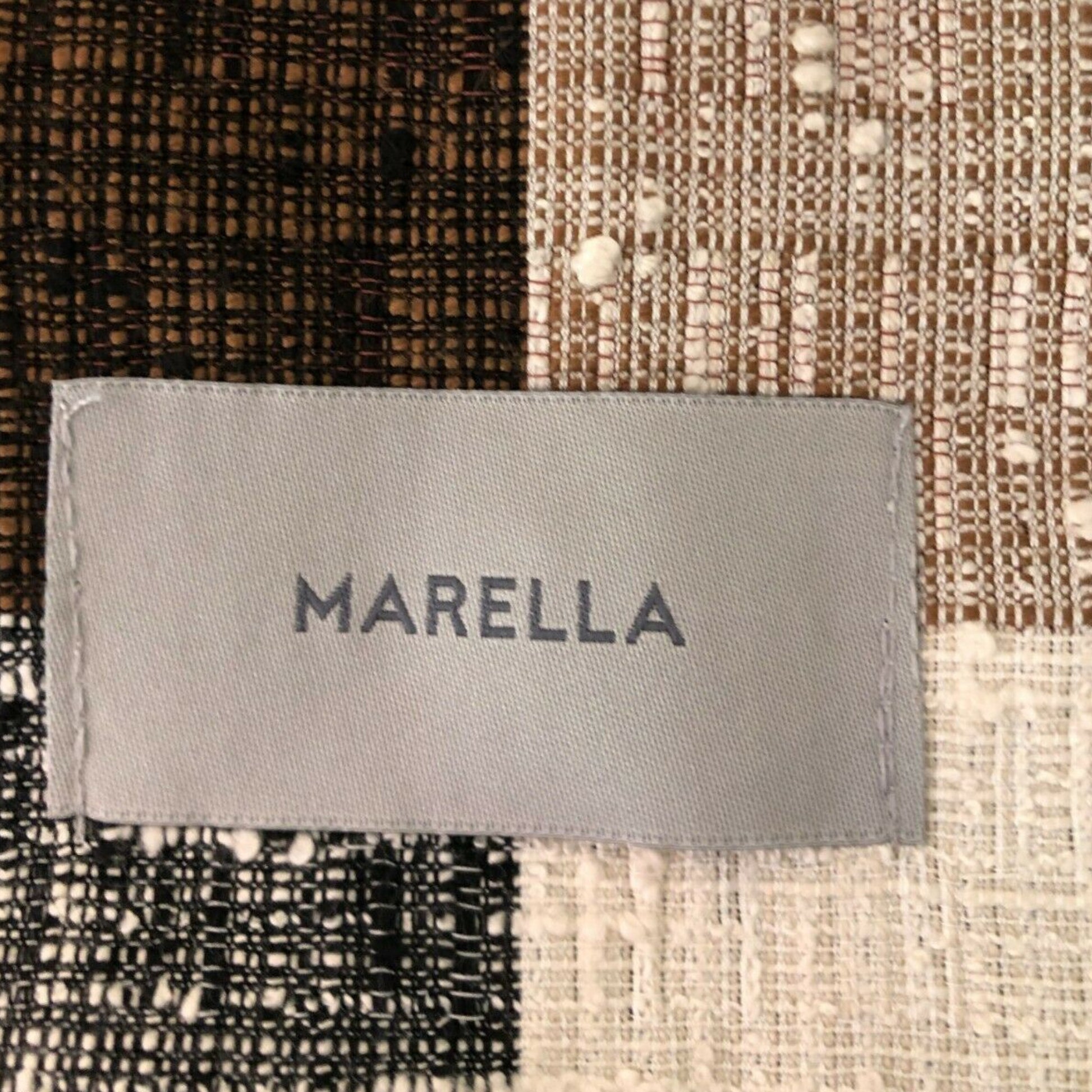 MARELLA label on a textured fabric background