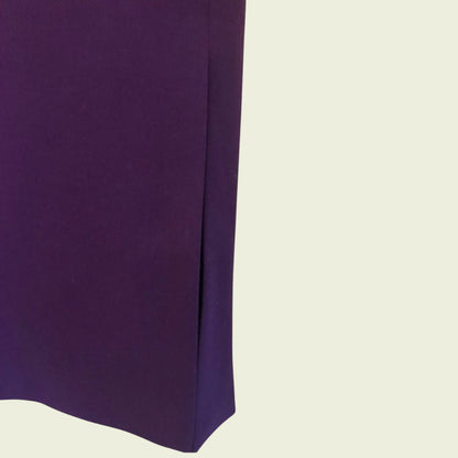 Purple fabric skirt on a beige background