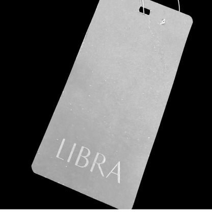 Gray label with 'LIBRA' text on a navy background