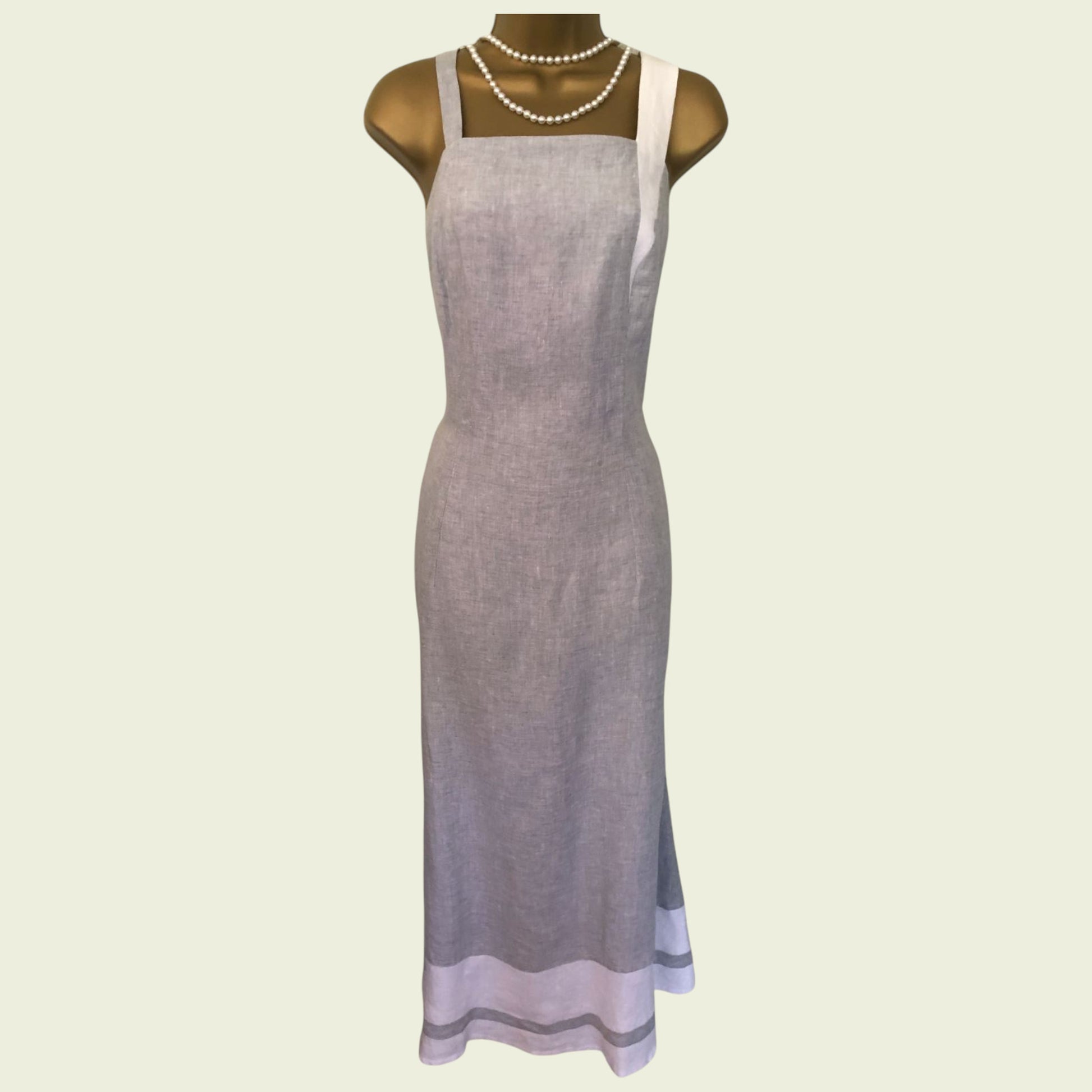 Light purple dress on a mannequin with a white background