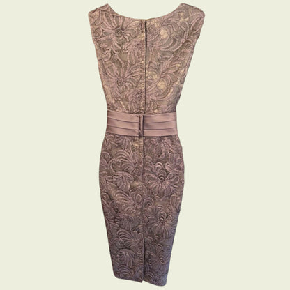 Patterned dress with a belt on a beige background