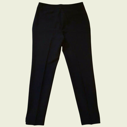 Black pants on a beige background