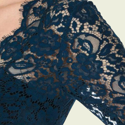 Teal lace detail on beige background