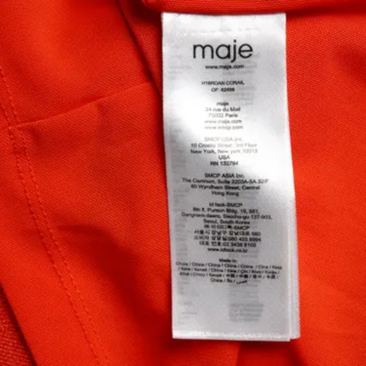 Maje label on a red garment