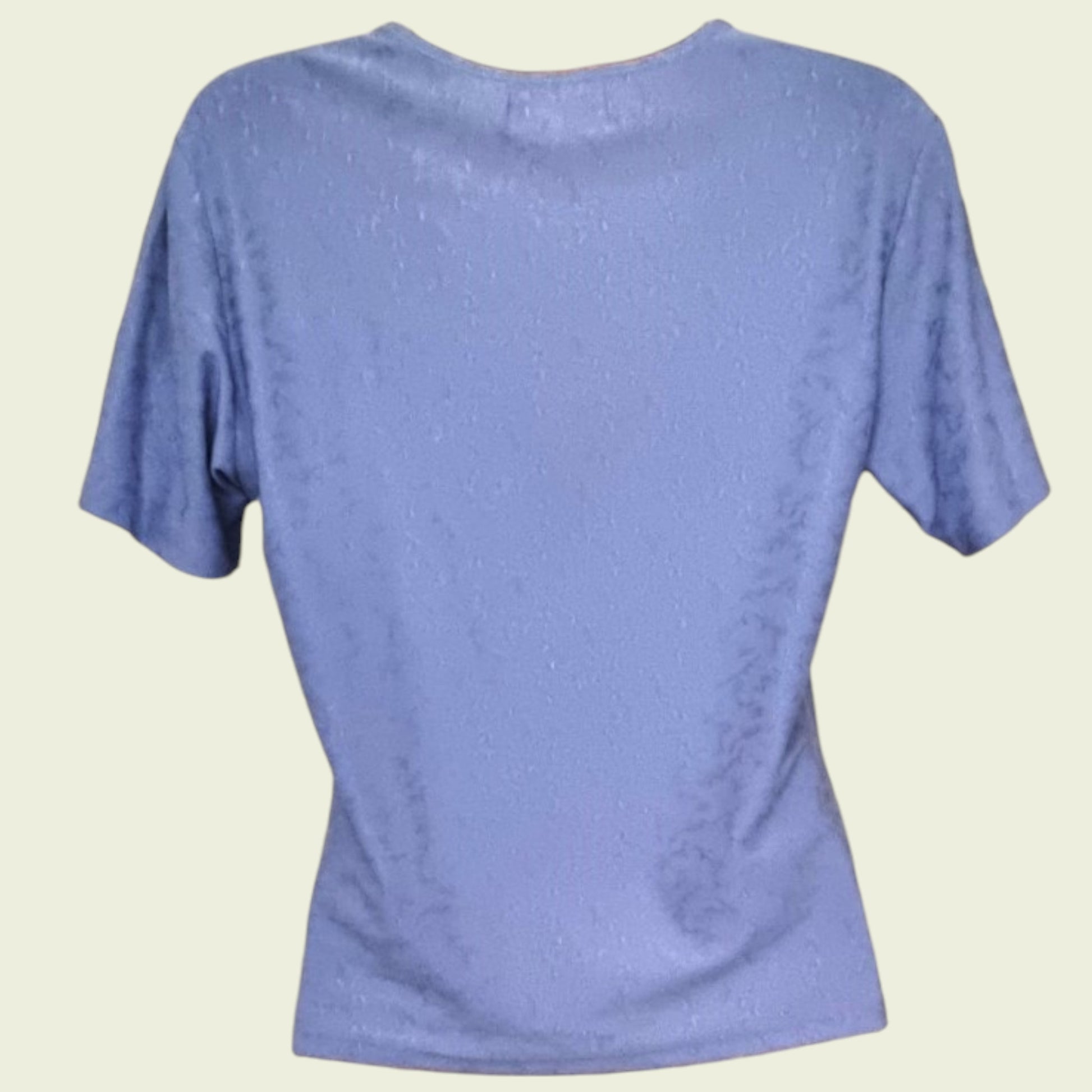 Plain blue t-shirt on a beige background