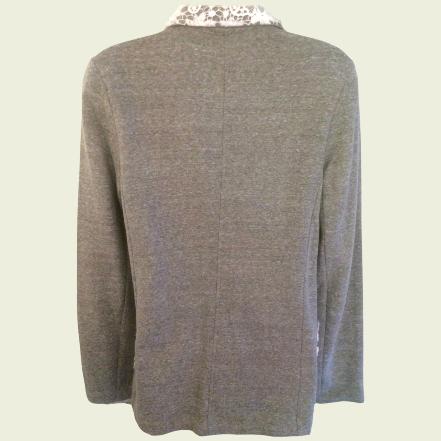 Gray jacket on a beige background