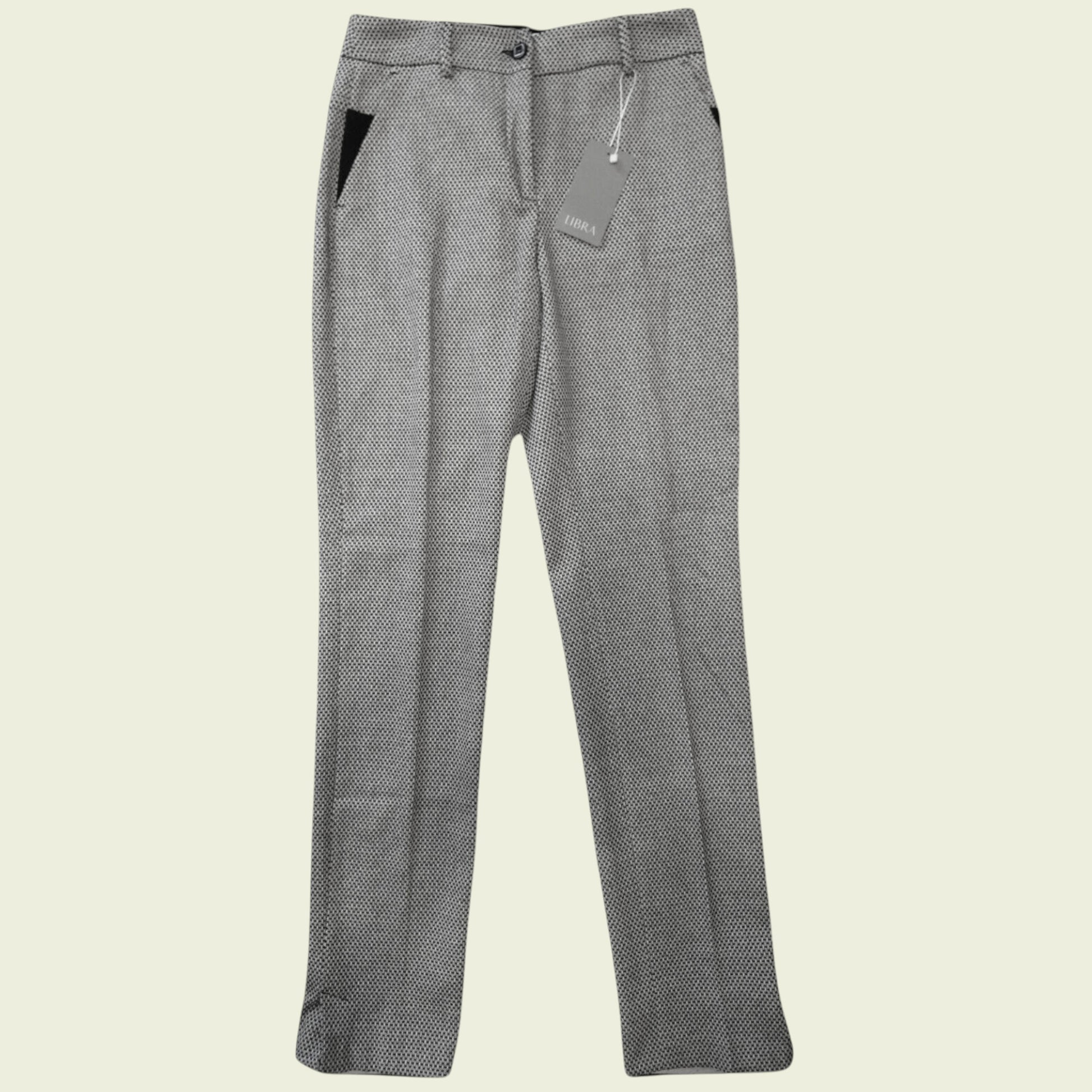 Gray patterned pants on a beige background