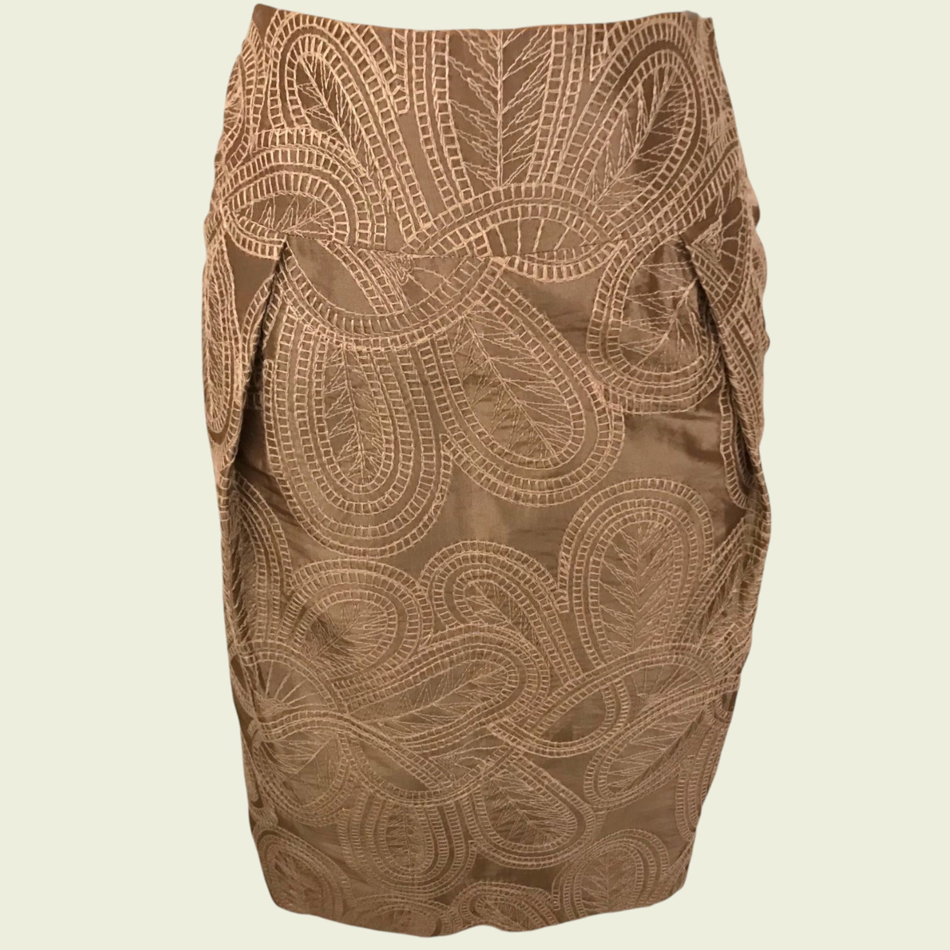 Brown patterned skirt on a beige background