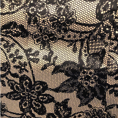 Lace detail fabric on beige background