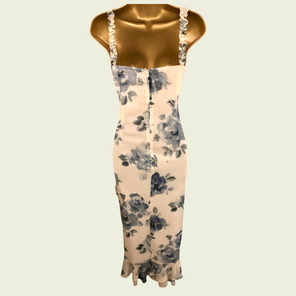 Floral dress on a beige background