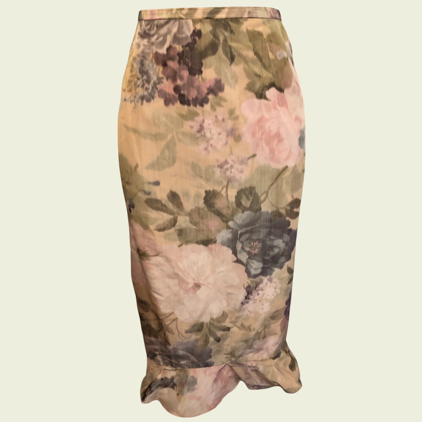 Floral patterned pencil skirt on a beige background