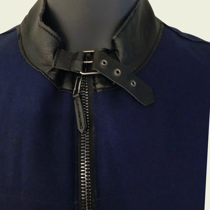 Navy blue jacket with black leather collar and zipper on a neutral background