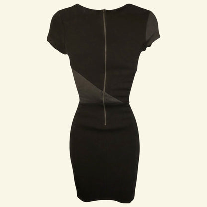 Black dress with a zipper detail on a white background