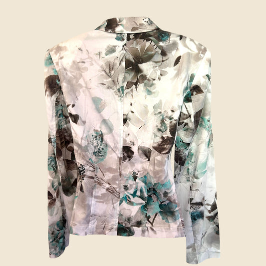 Floral patterned jacket on a beige background