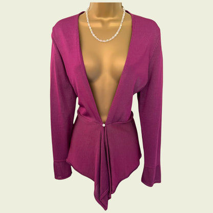 Fuchsia open-front cardigan on a mannequin with a plain background