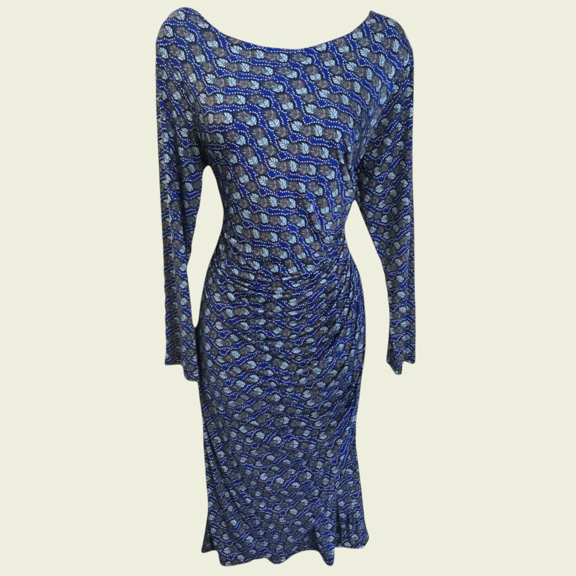 Blue patterned dress on a beige background