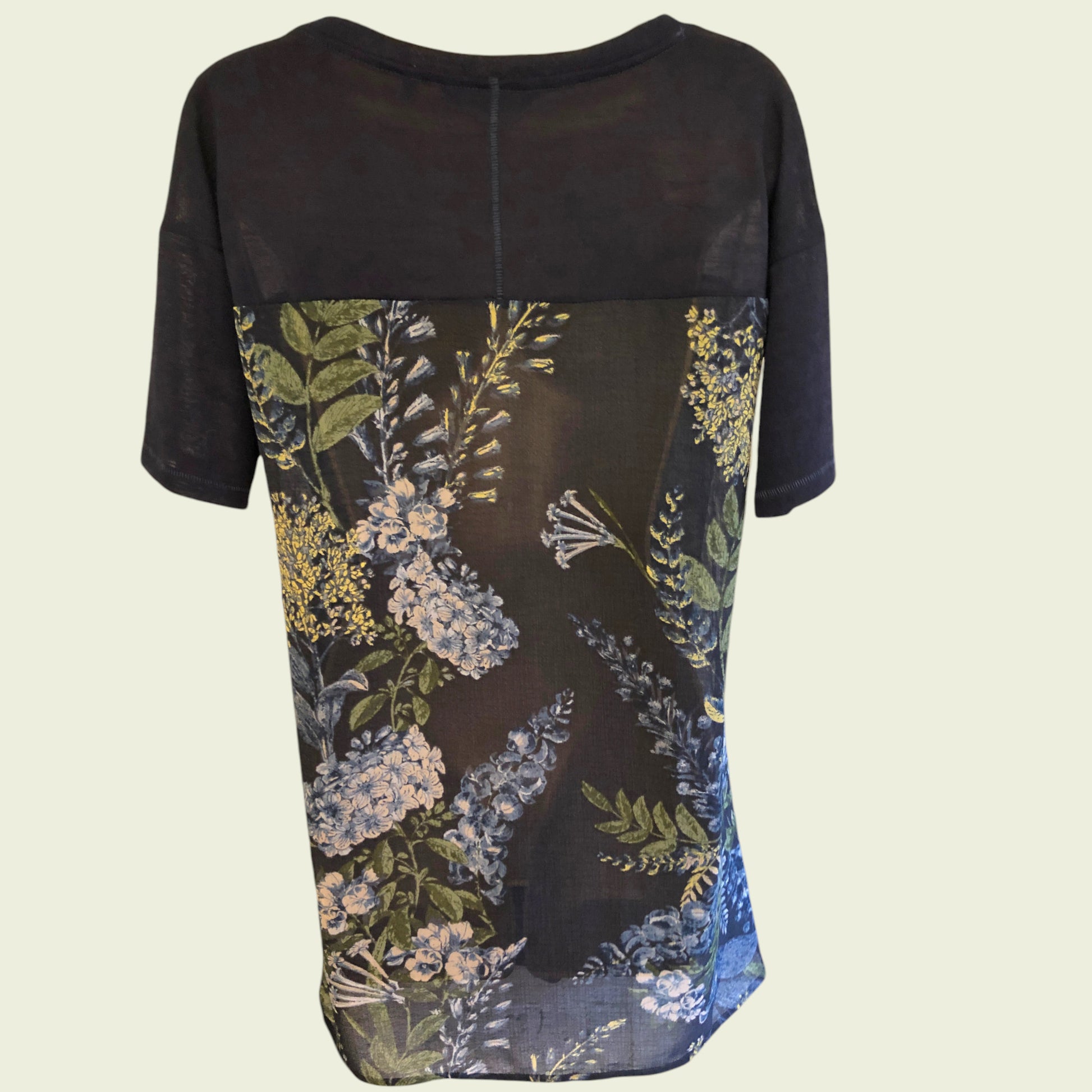 Navy dress with floral pattern on a beige background