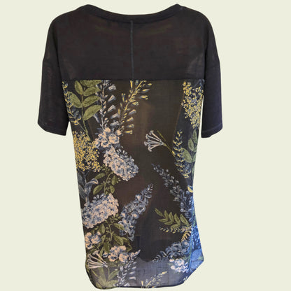 Navy dress with floral pattern on a beige background