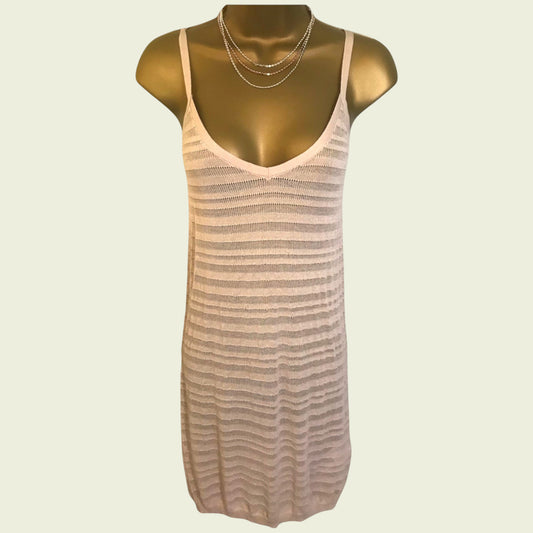 Beige striped mini dress on a mannequin against a beige background