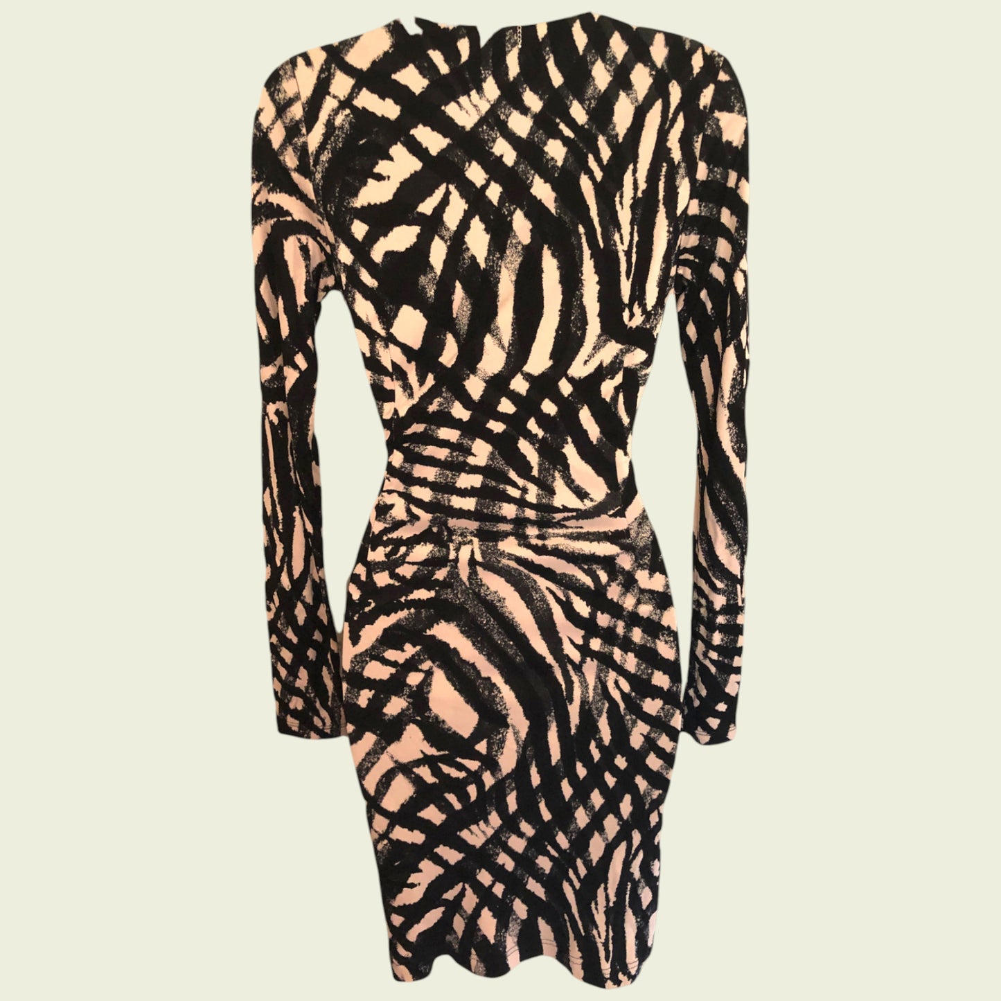 Dress with black and beige abstract pattern on a beige background