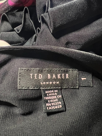 Ted Baker London label on a garment with visible text and design details.