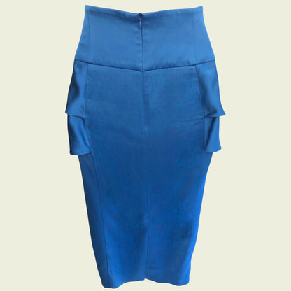 Blue skirt with ruffled layers on a beige background