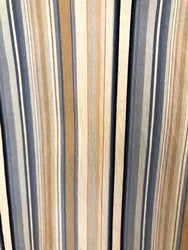 Close-up of striped fabric with horizontal lines in various colors.