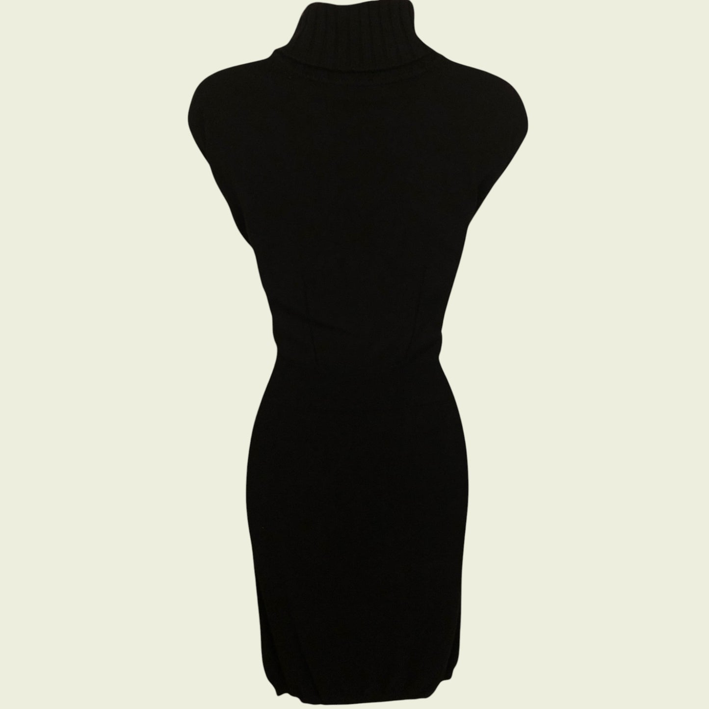 Black dress on a mannequin against a white background