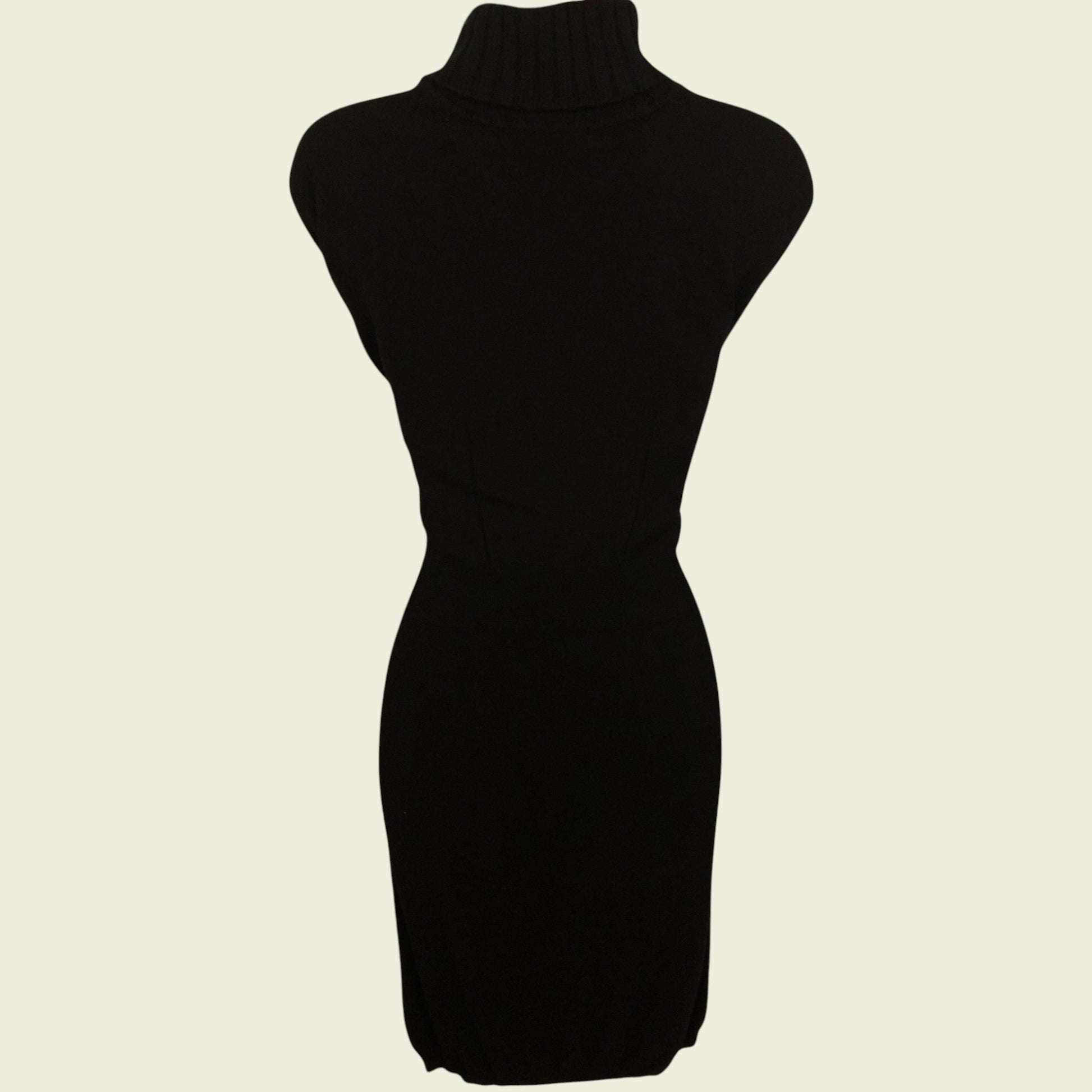 Black dress on a mannequin against a white background